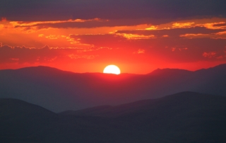 silhouette of mountains during sunset