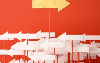 a red wall with a yellow arrow pointing in opposite directions